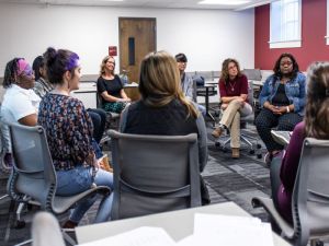 Social work class with instructor Lana Cook